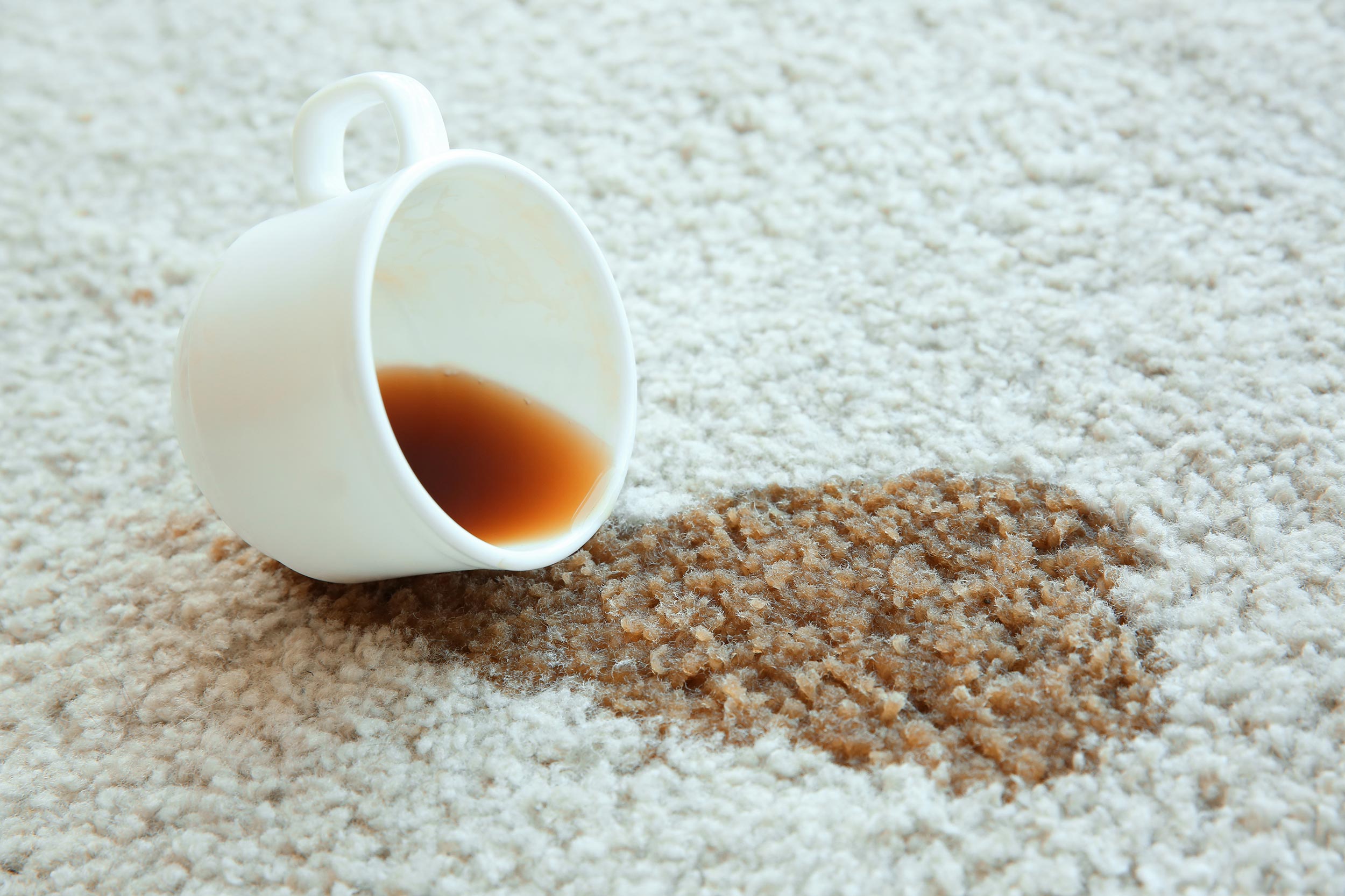 GRAWE Liability Insurance A cup of spilled coffee